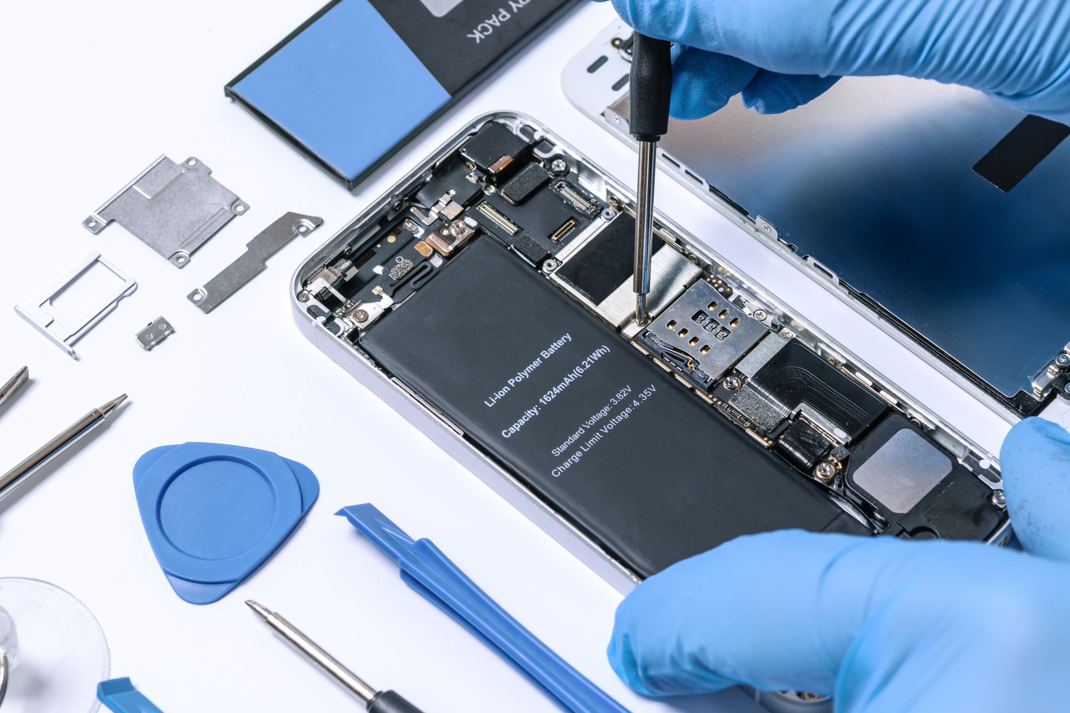 Technician Repairing Modern Smartphone